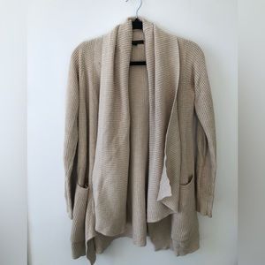 Delphine (Aritzia) beige cardigan w/ pockets. 100% cotton. Size XXS. Gently used